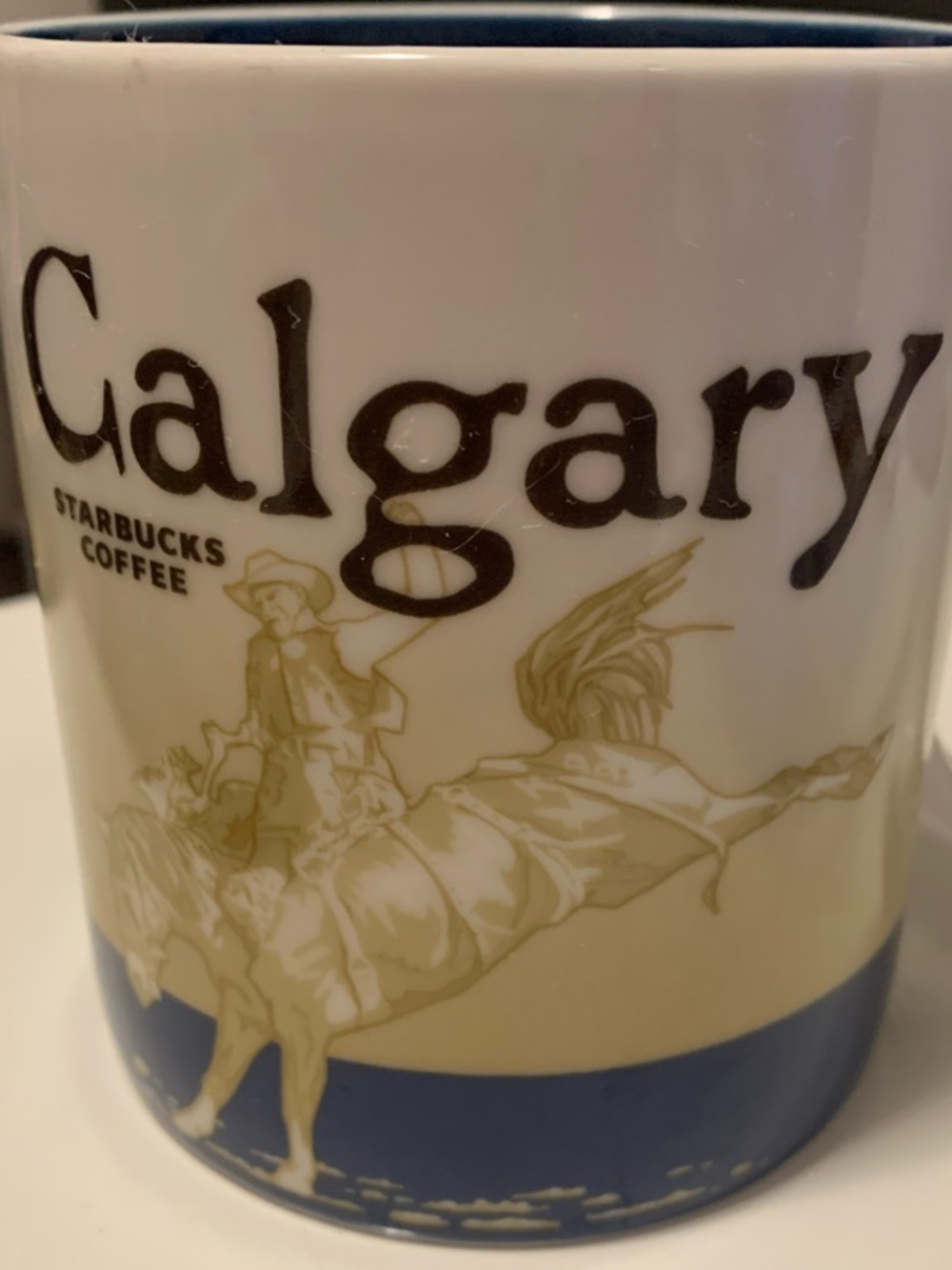 Starbucks Calgary Ceramic Mug — White, Blue and Gold Design Collector Series